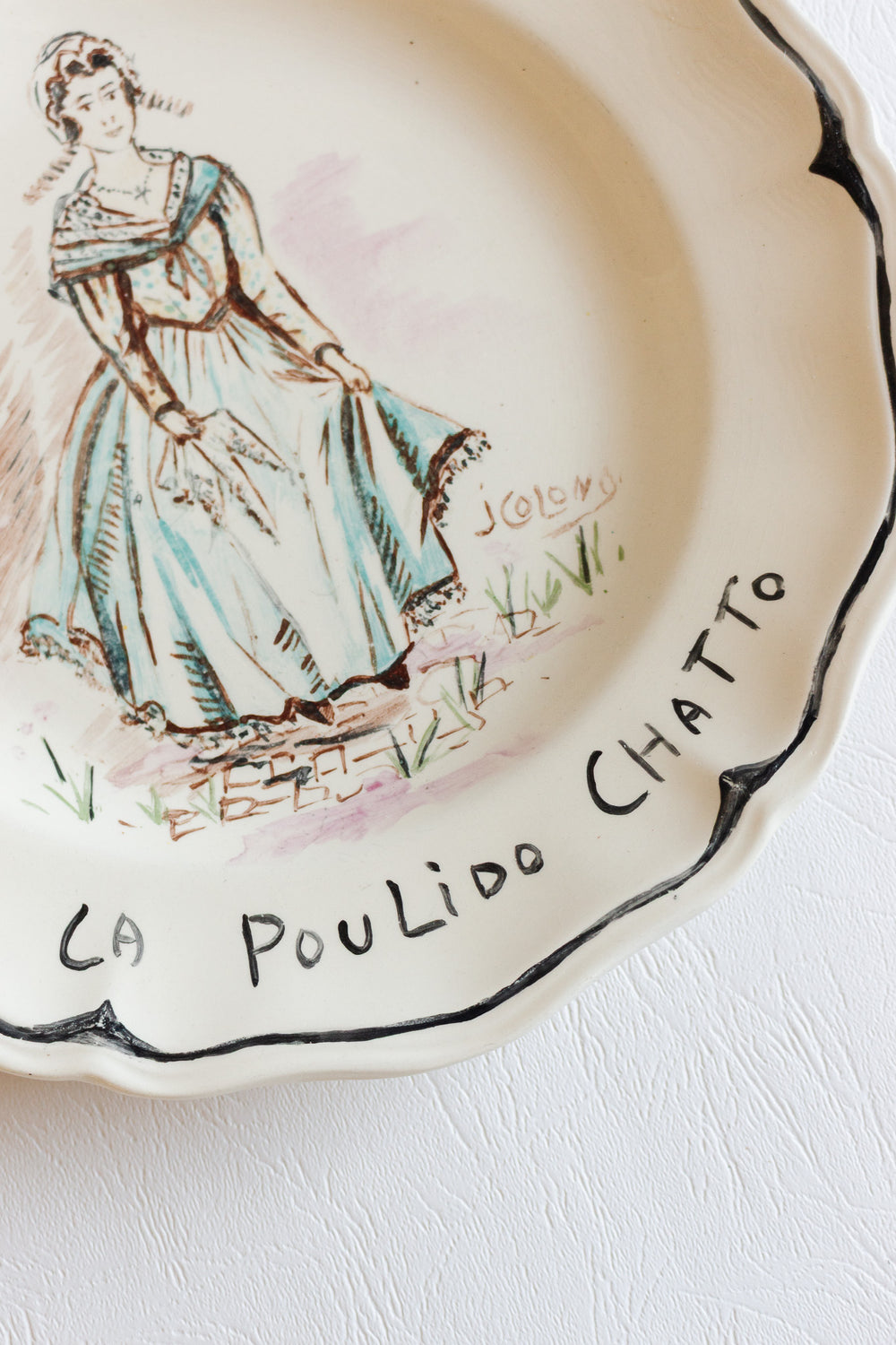 1920s sarreguemines talking plate, design by j colong
