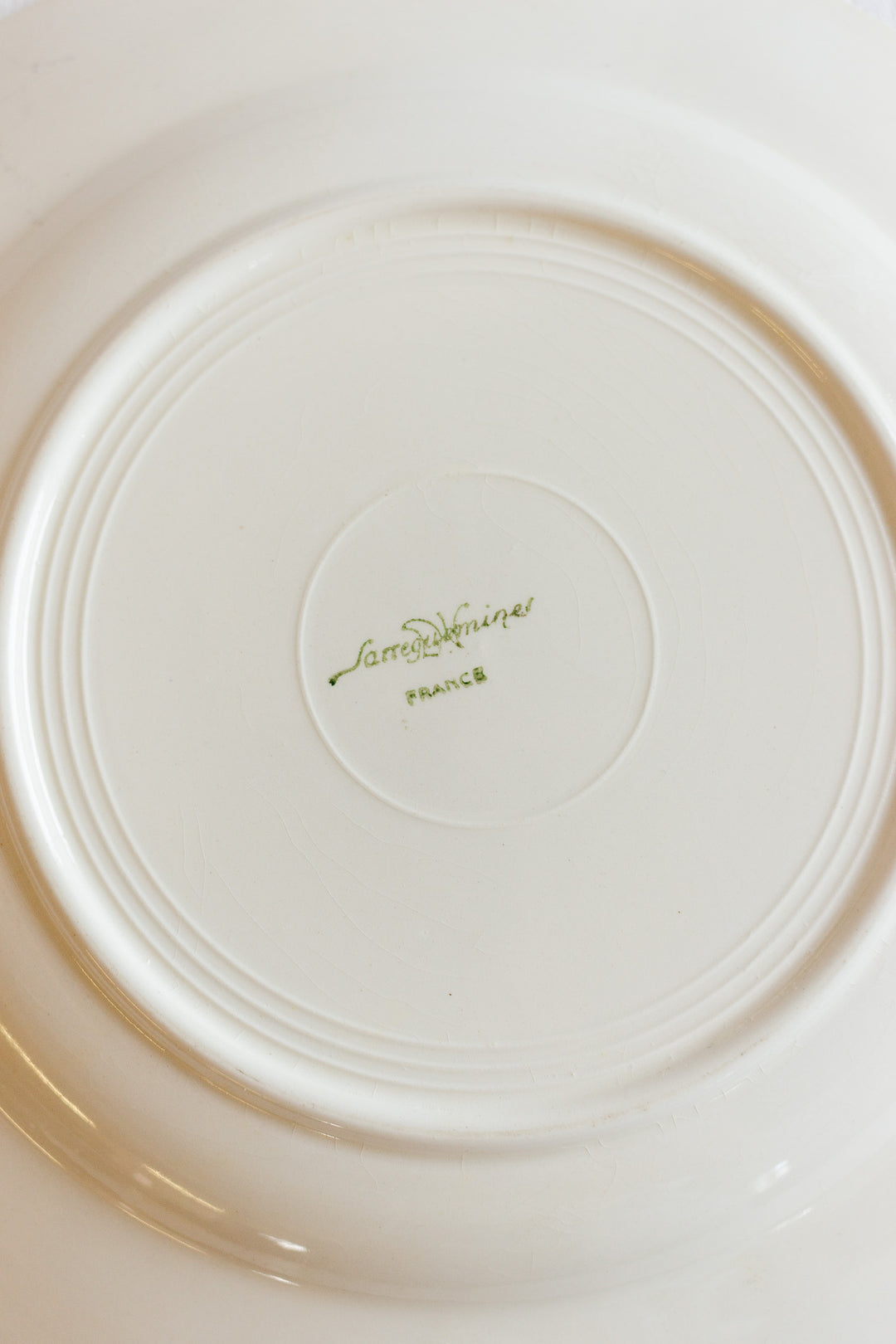 pair of 1920s sarreguemines talking plates, design by j colong