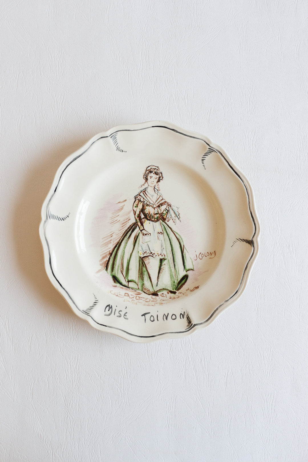 pair of 1920s sarreguemines talking plates, design by j colong