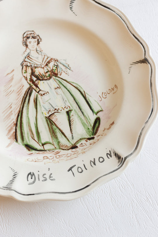 pair of 1920s sarreguemines talking plates, design by j colong