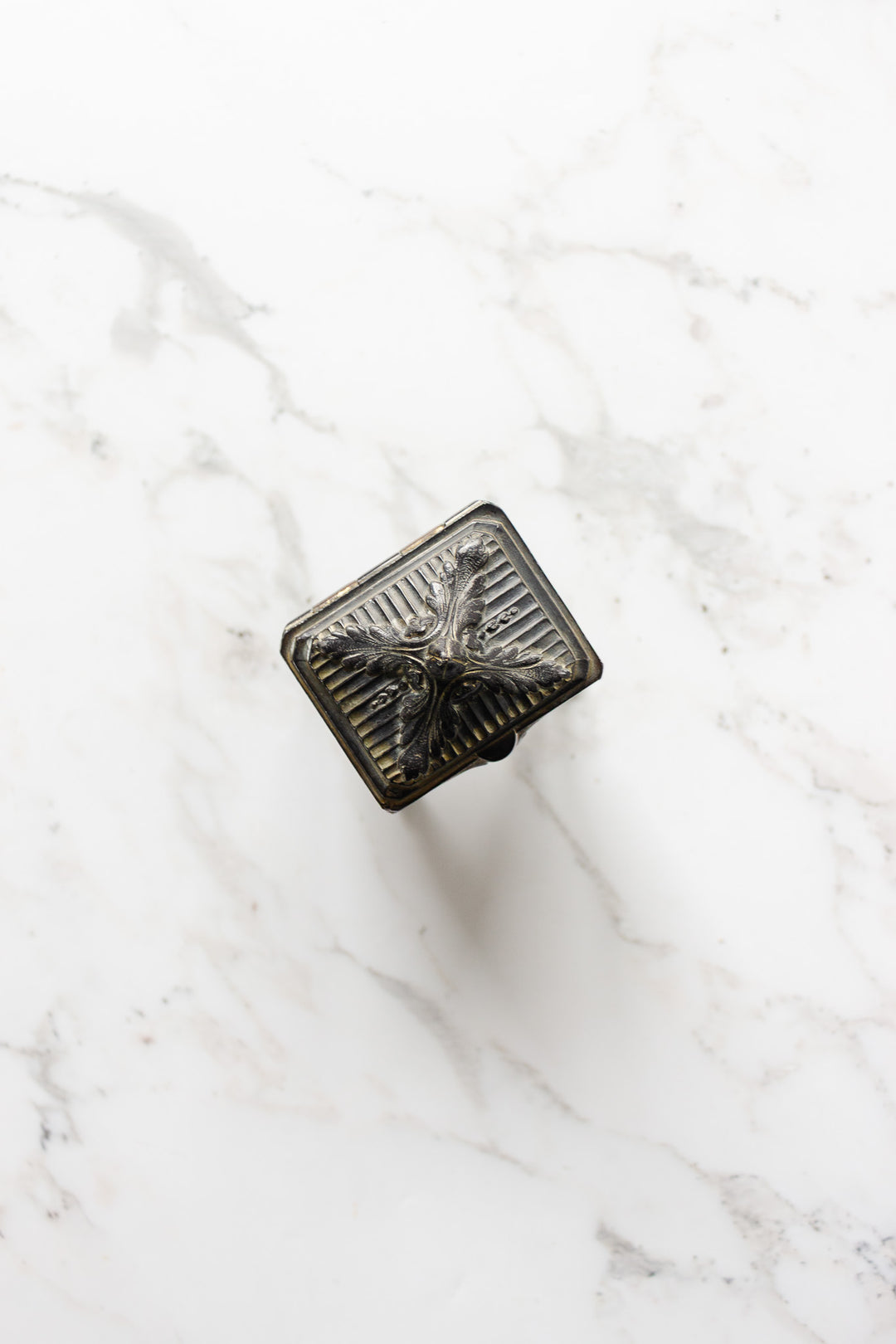 vintage french cast metal casket with tufted ruby cushion