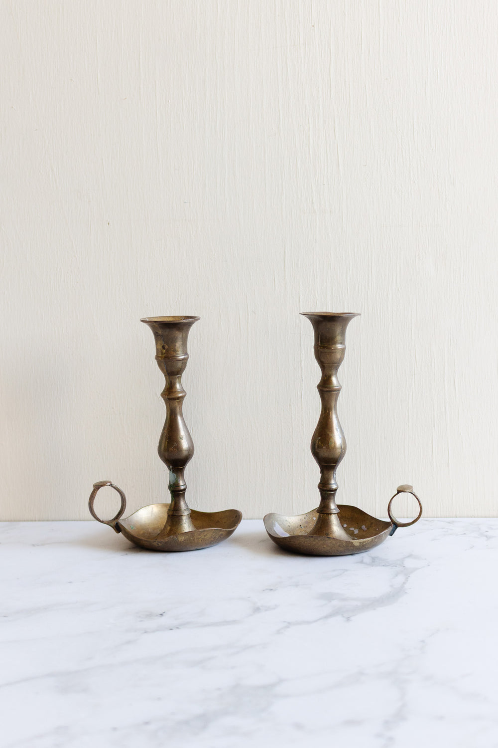 pair of vintage french finger loop chambersticks