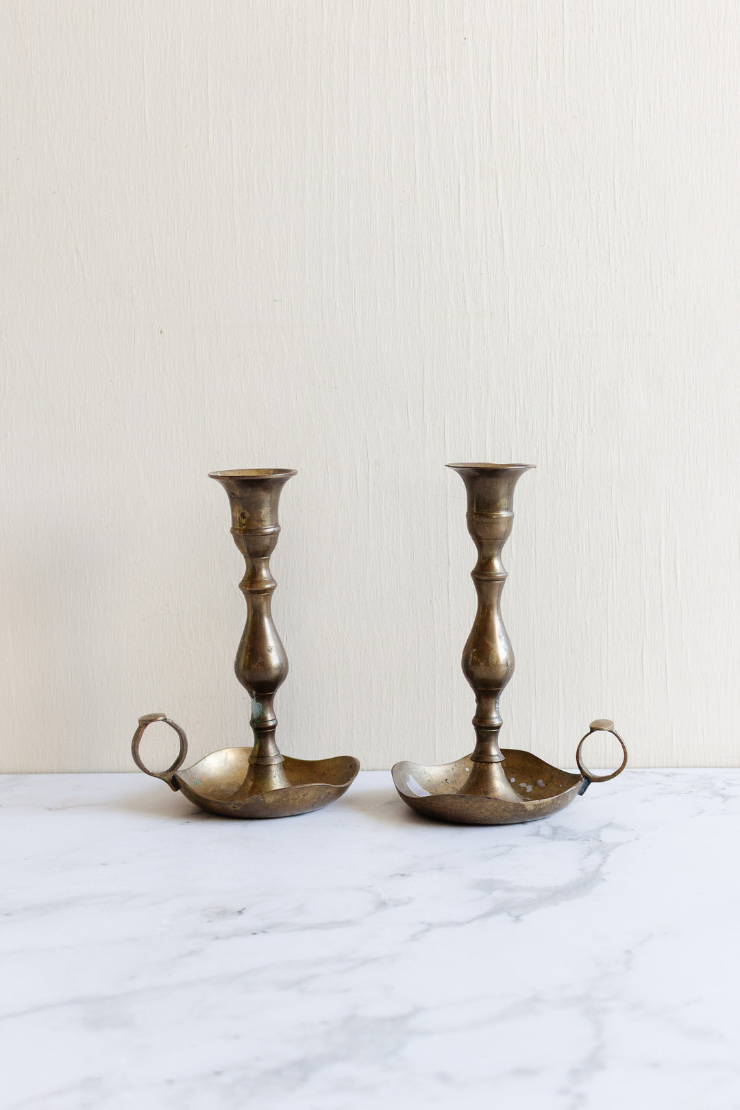 pair of vintage french finger loop chambersticks