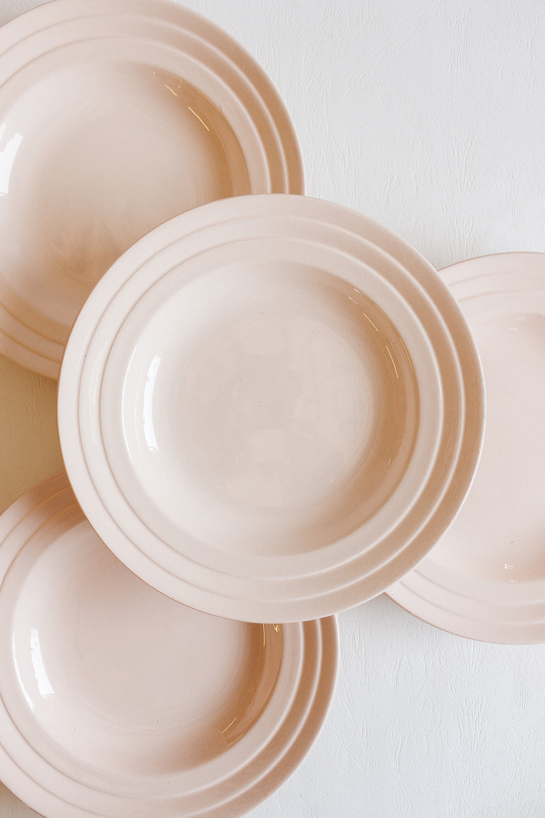 set of four 1930s french "ceranord" st. amand pink soup bowls