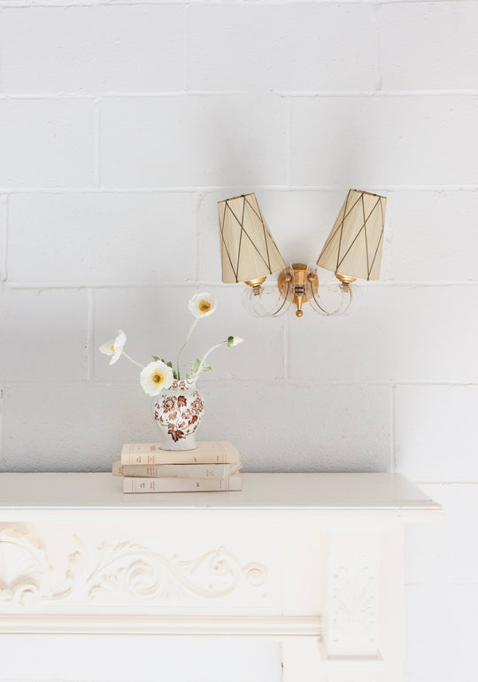 midcentury wall sconce, in the style of Jules Leleu