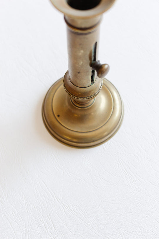 antique french brass push up candlestick