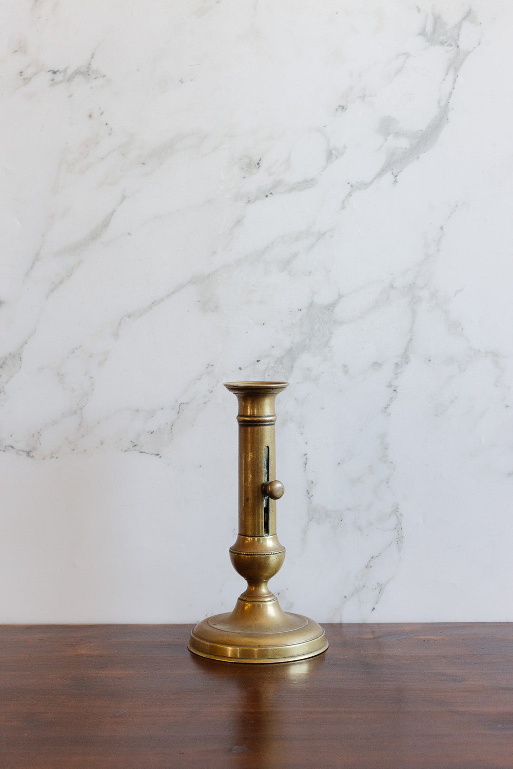 antique french brass push up candlestick