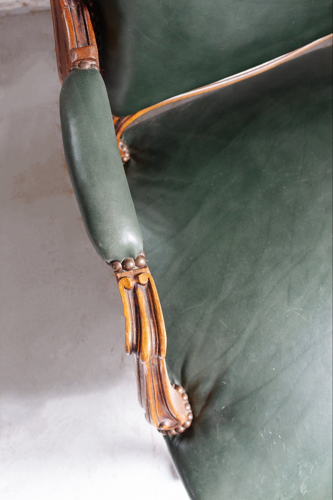 Louis XV carved walnut & leather armchair