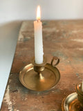 eclectic pair of vintage brass chamber sticks