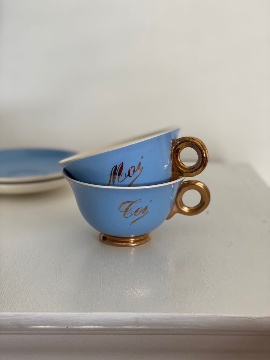 antique french "toi et moi" gold and cerulean teacups and saucers