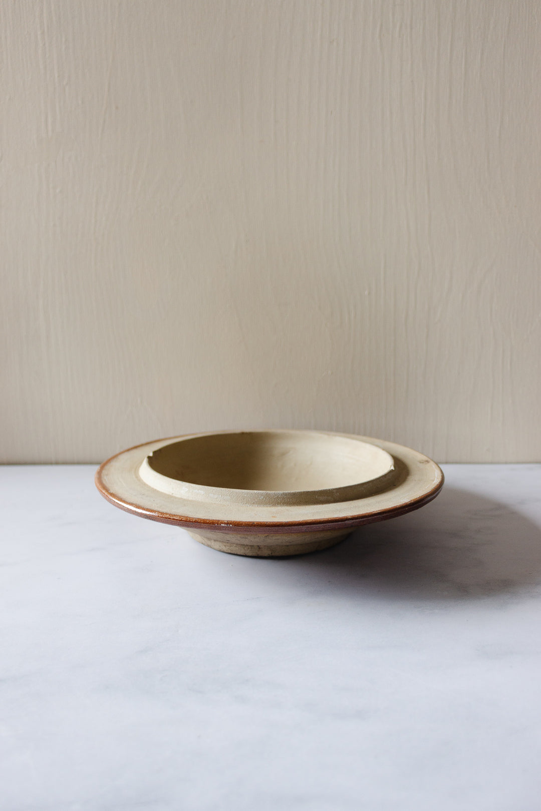 antique French large stoneware stamped bowl