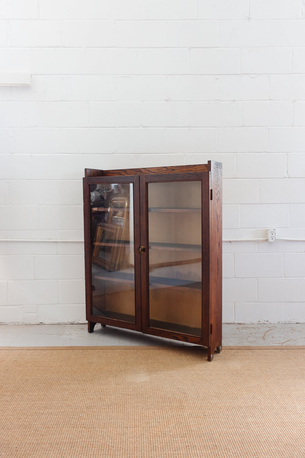 midcentury English oak and glass cabinet