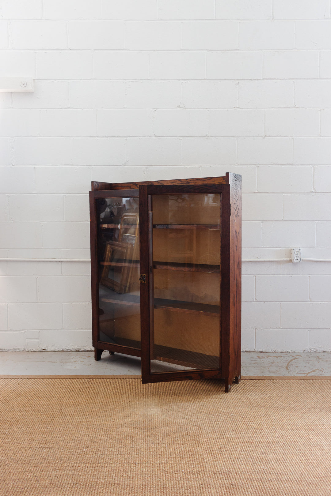 midcentury English oak and glass cabinet