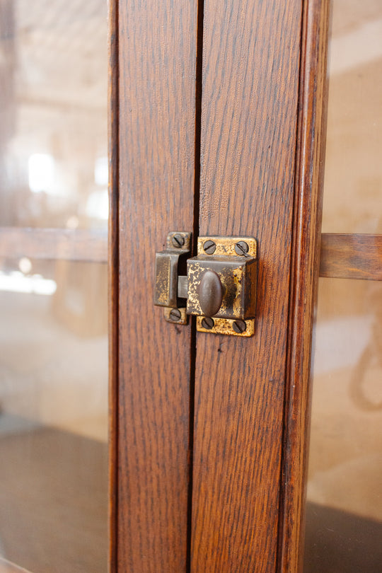 midcentury English oak and glass cabinet
