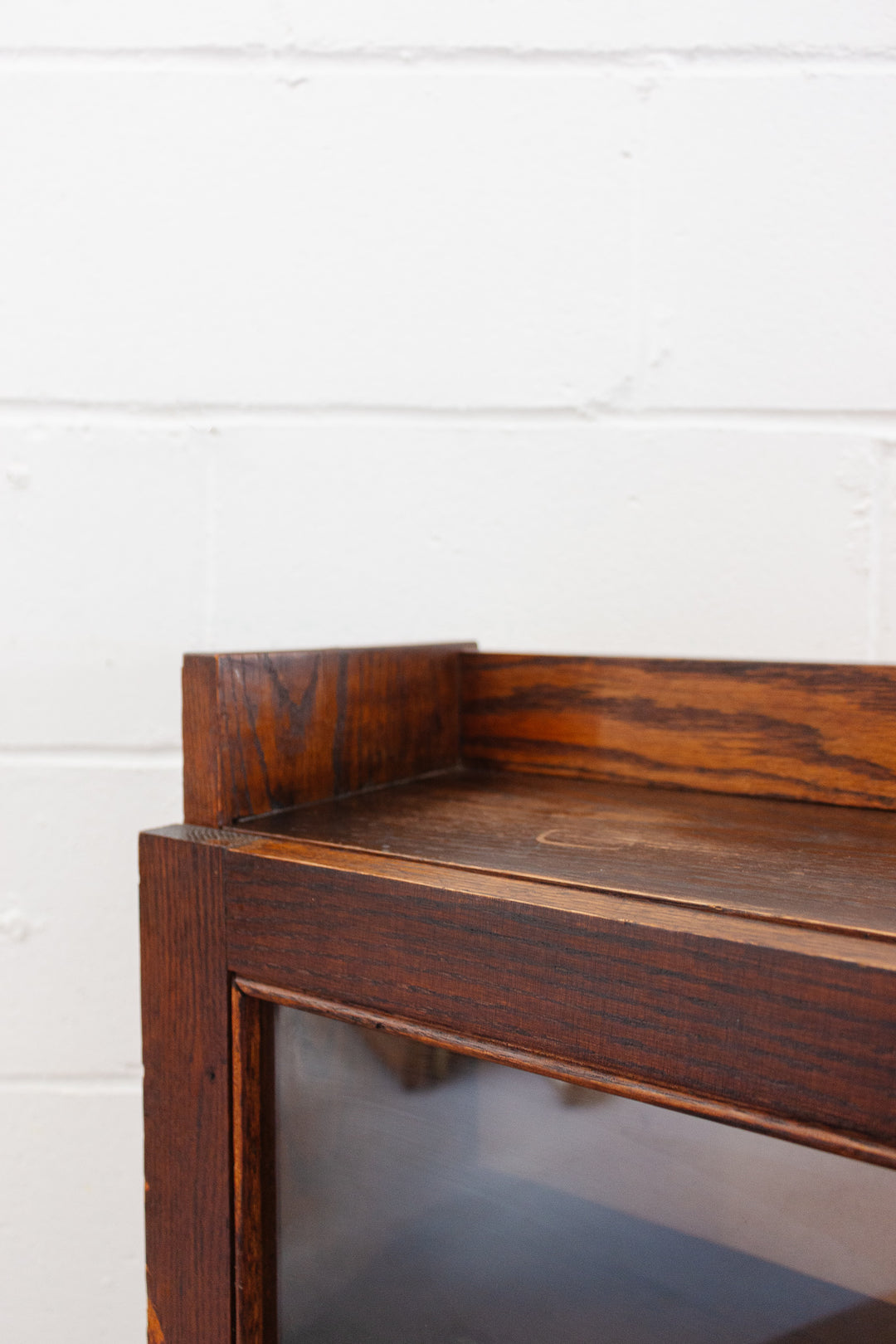 midcentury English oak and glass cabinet