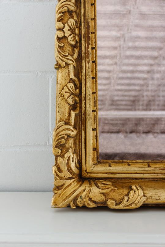 vintage french gilt wood mirror with pink glass