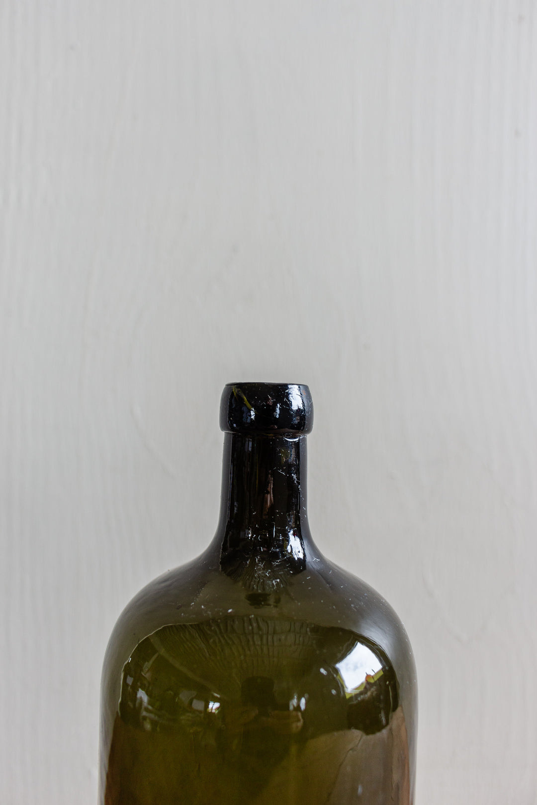 set of three antique green glass bottles