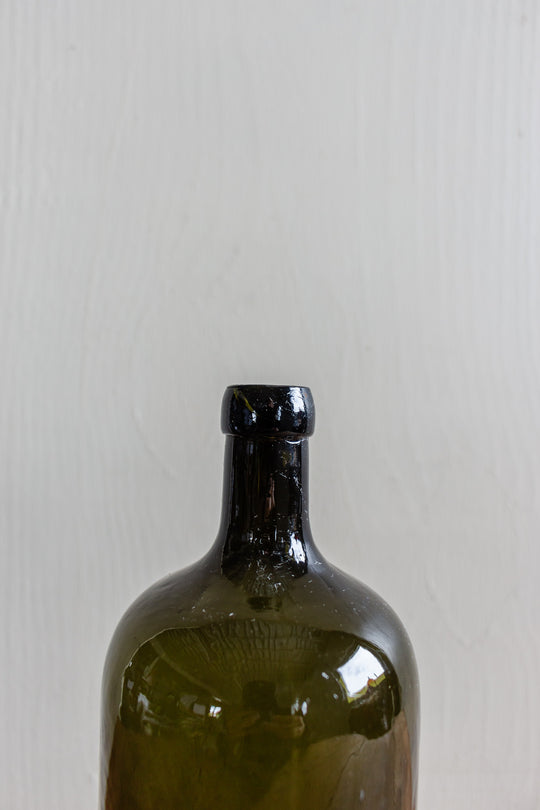 set of three antique green glass bottles