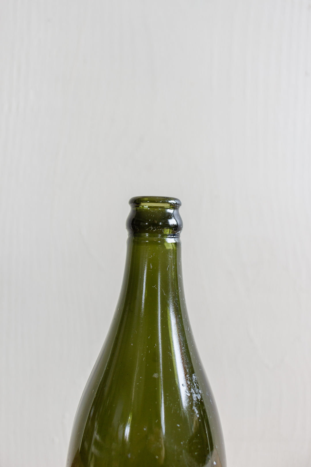 set of three antique green glass bottles