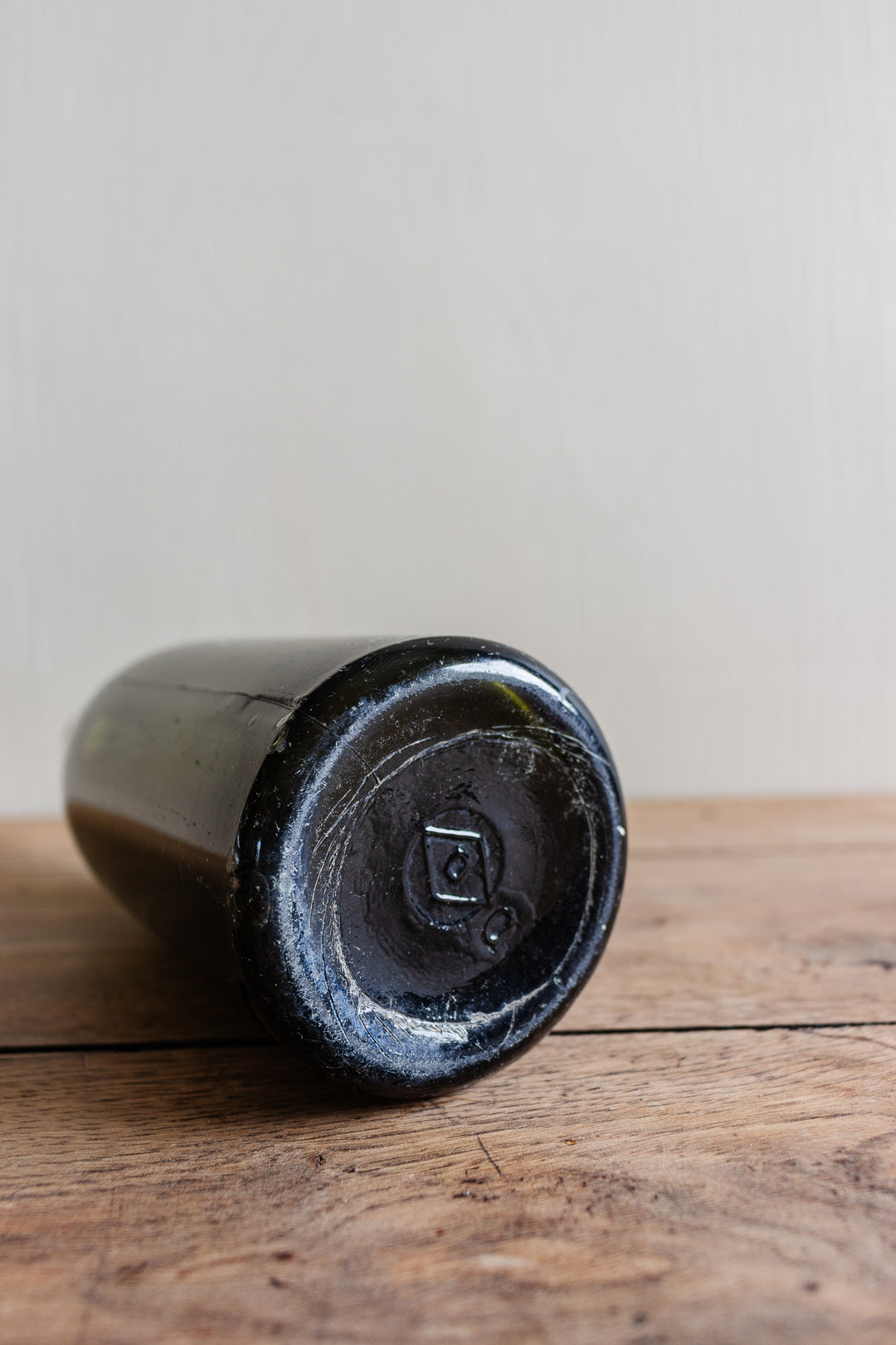 set of three antique green glass bottles