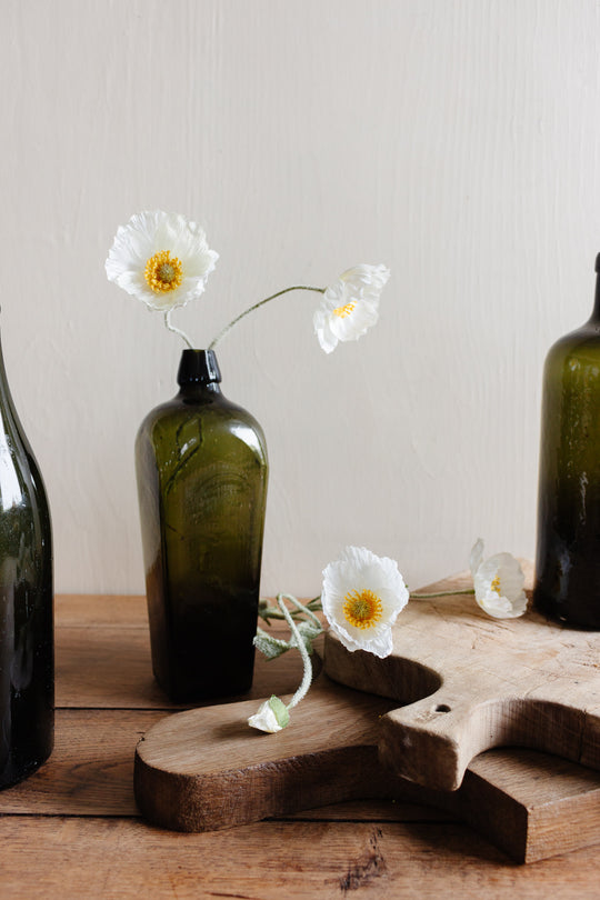 set of three antique green glass bottles