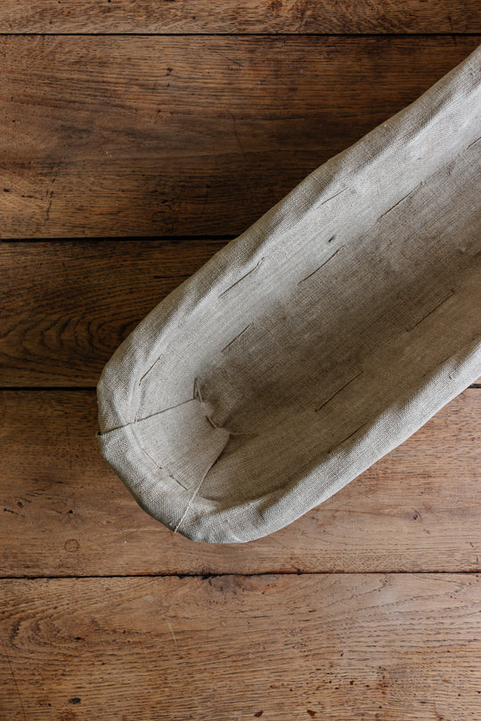 vintage French linen lined baguette basket