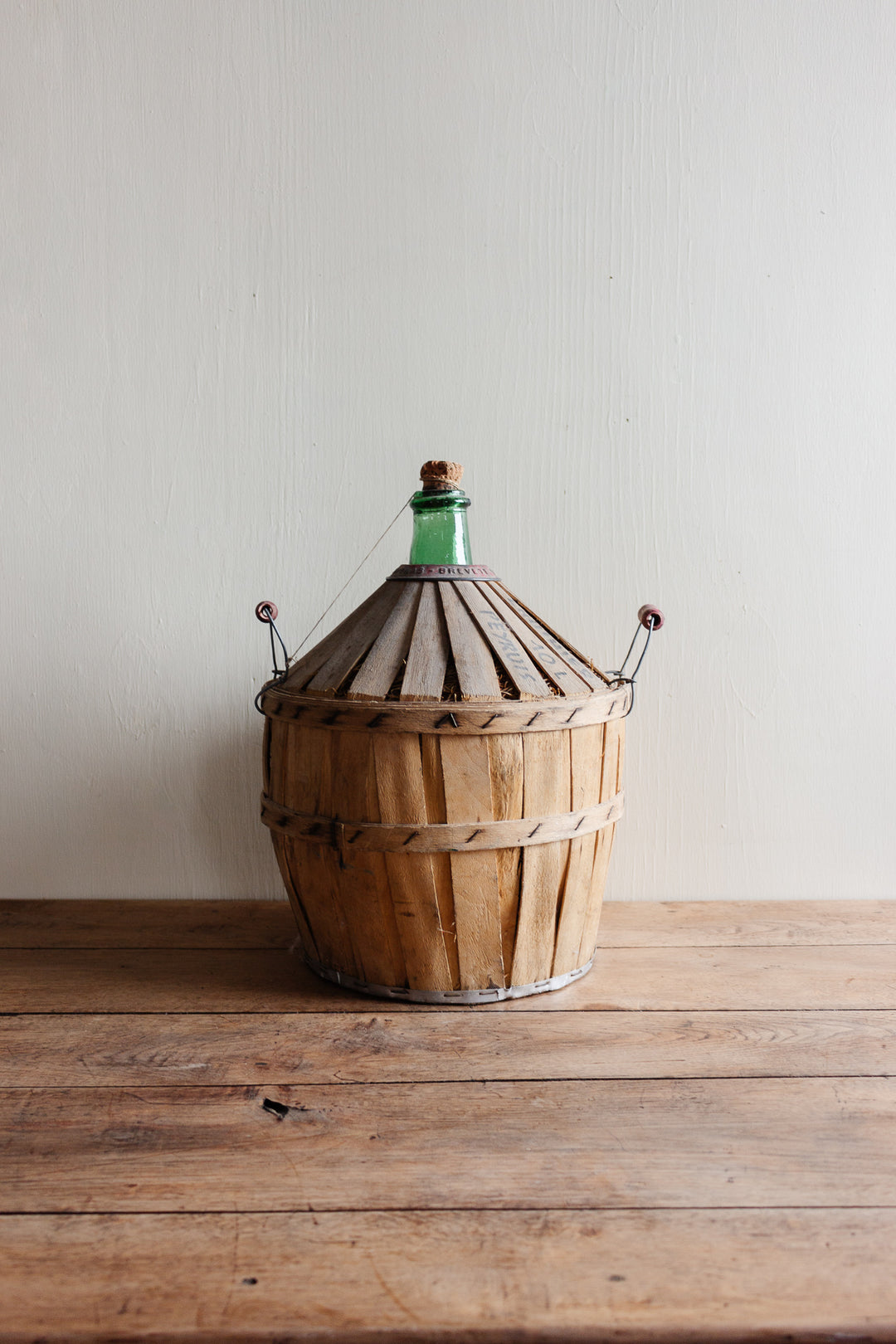 antique French Brevete Perrin & Fils Rognonas demijohn with wood strapping