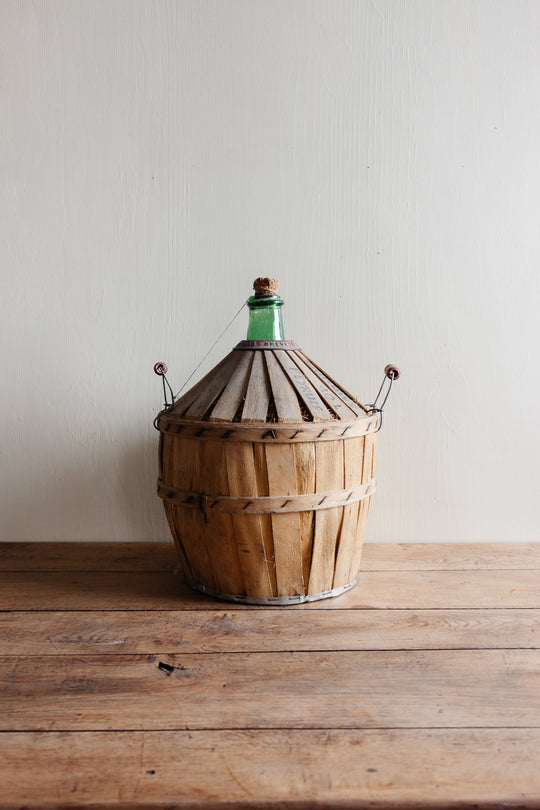 antique French Brevete Perrin & Fils Rognonas demijohn with wood strapping