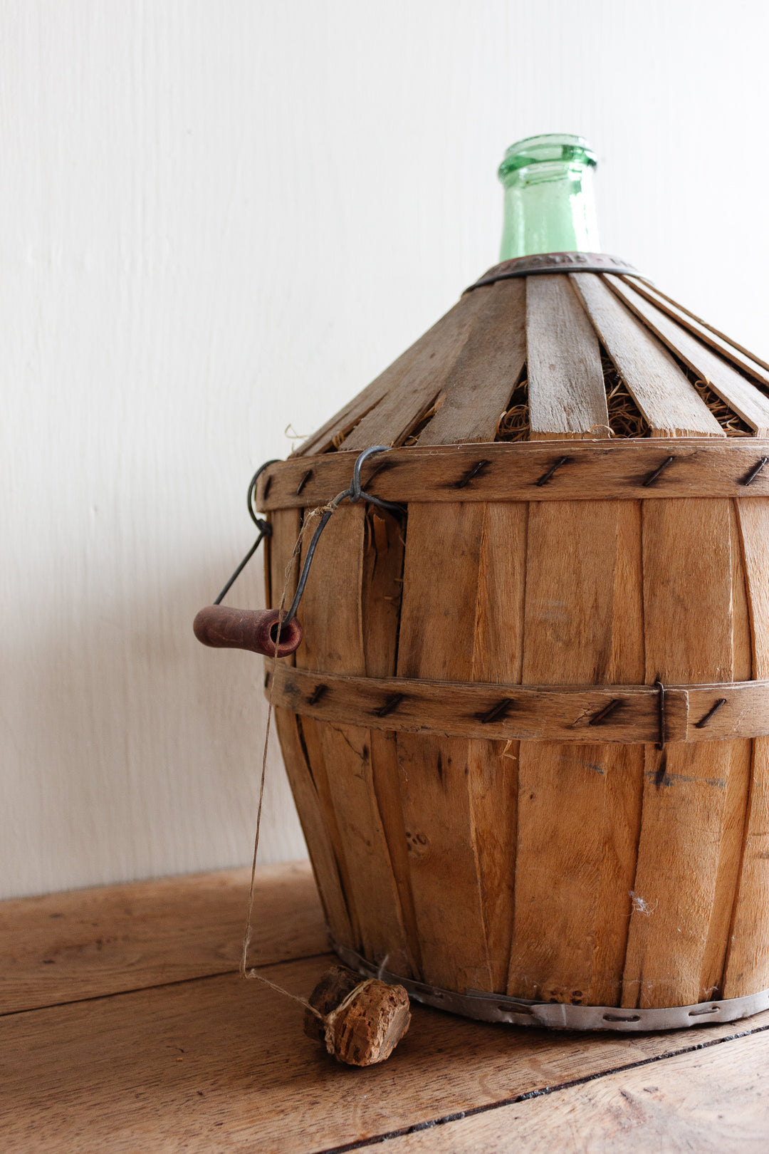 antique French Brevete Perrin & Fils Rognonas demijohn with wood strapping