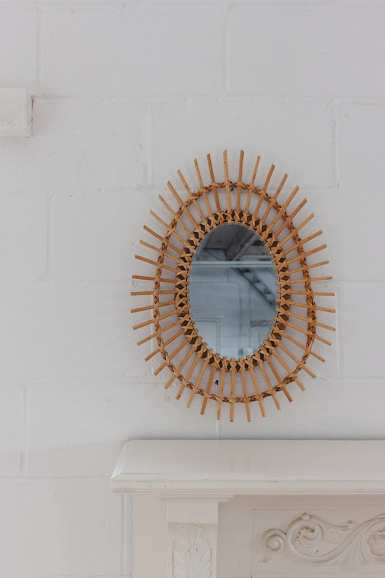 vintage French sunburst rattan mirror