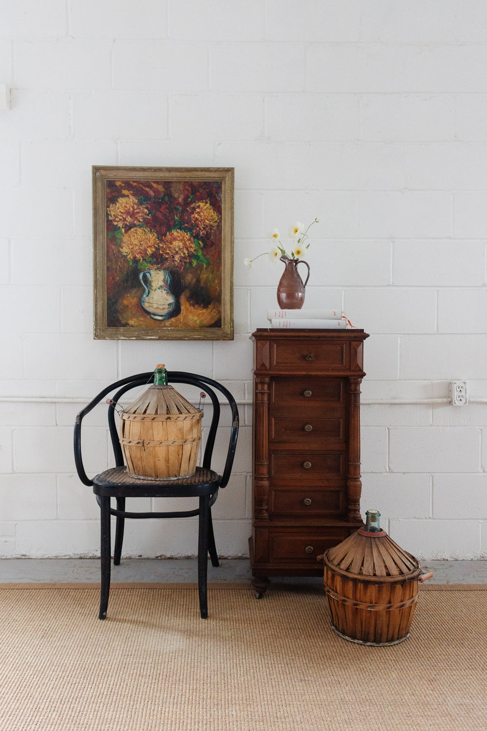 vintage French demijohn with wood strapping