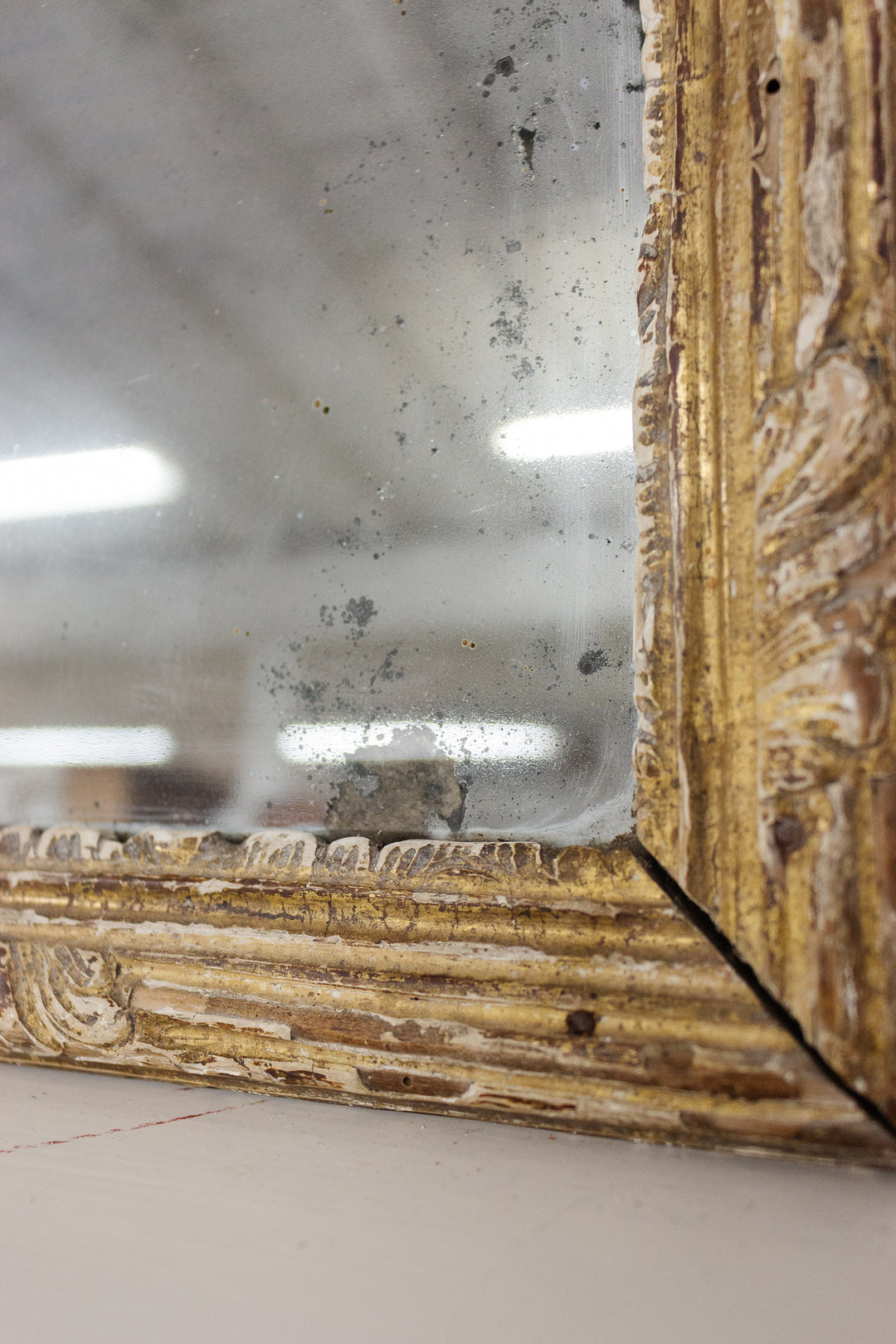 19th century french distressed gilt mirror