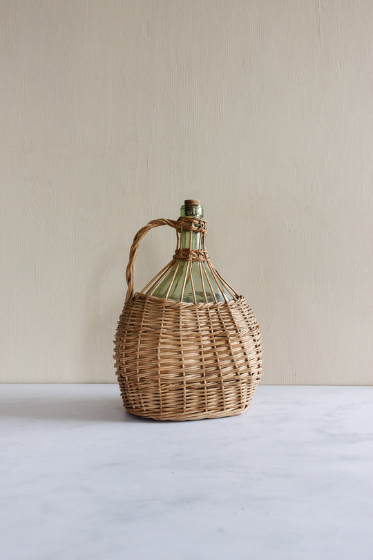 vintage french wicker wrapped jug