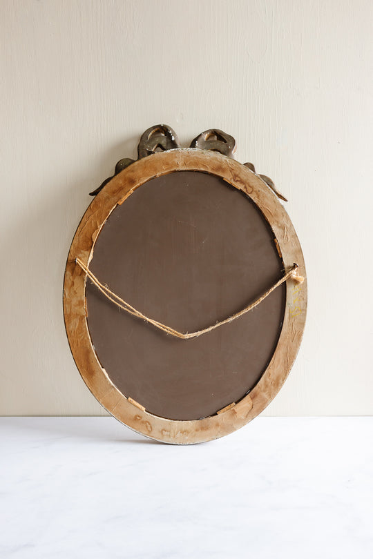 antique French Louis XVI bow mirror