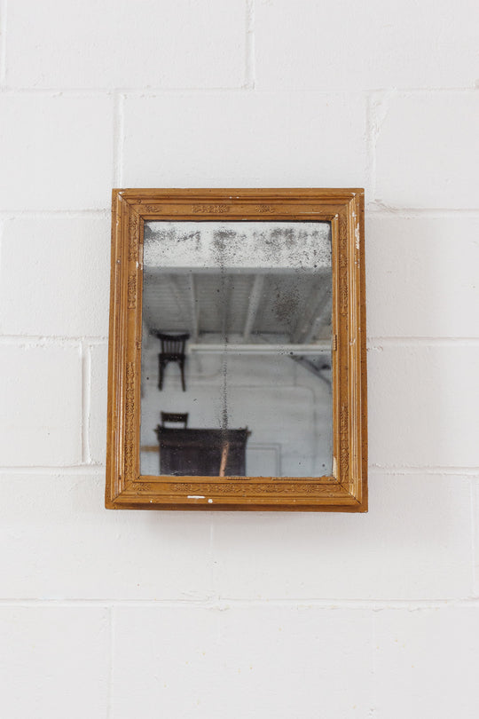 antique French Louis XIII style mirror with distressed glass