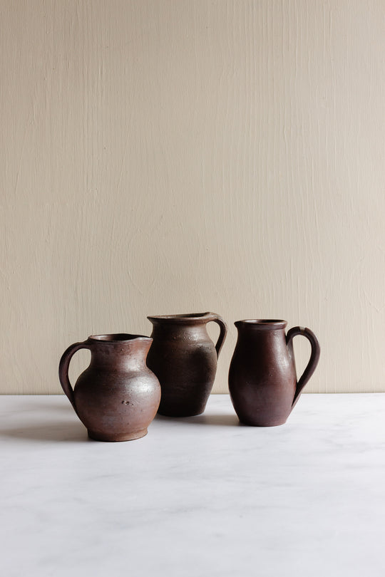 trio of vintage french stoneware pitchers