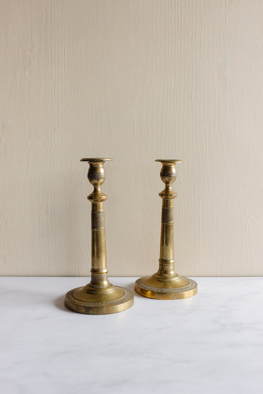 pair of antique french brass candlesticks