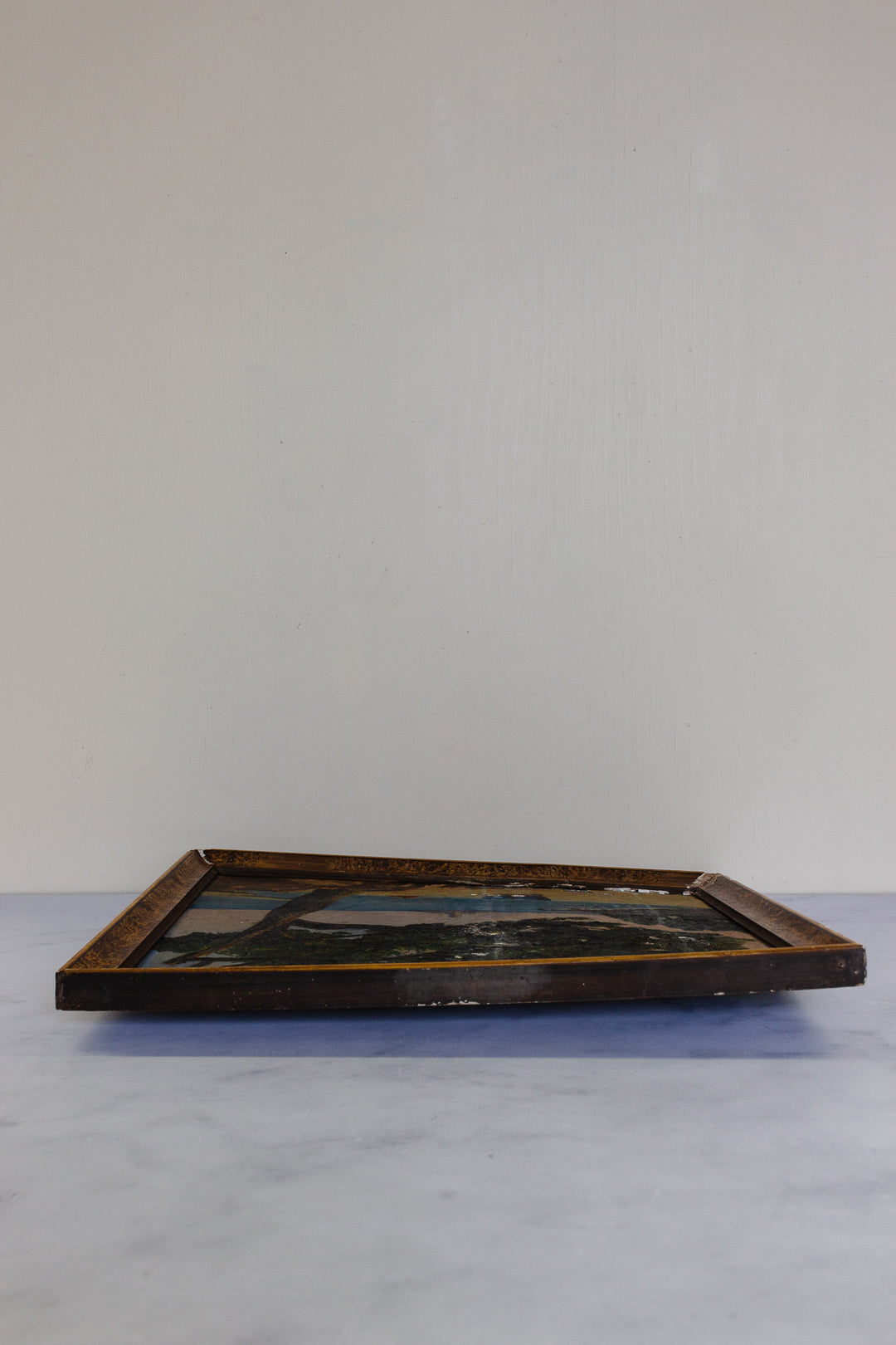 antique French oil on board painting with faux tortoise frame