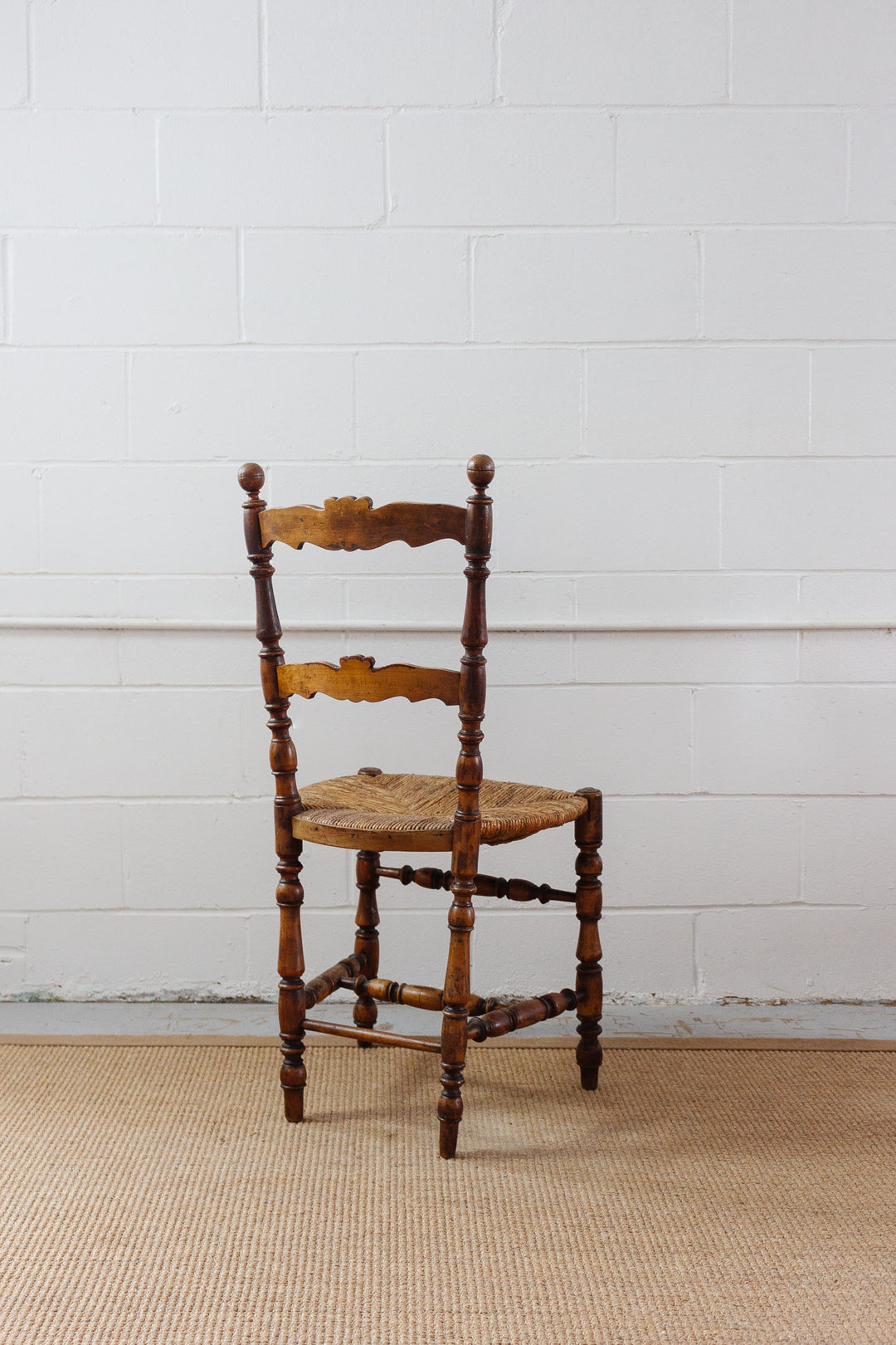 pair of 19th century French provincial walnut and rush chairs