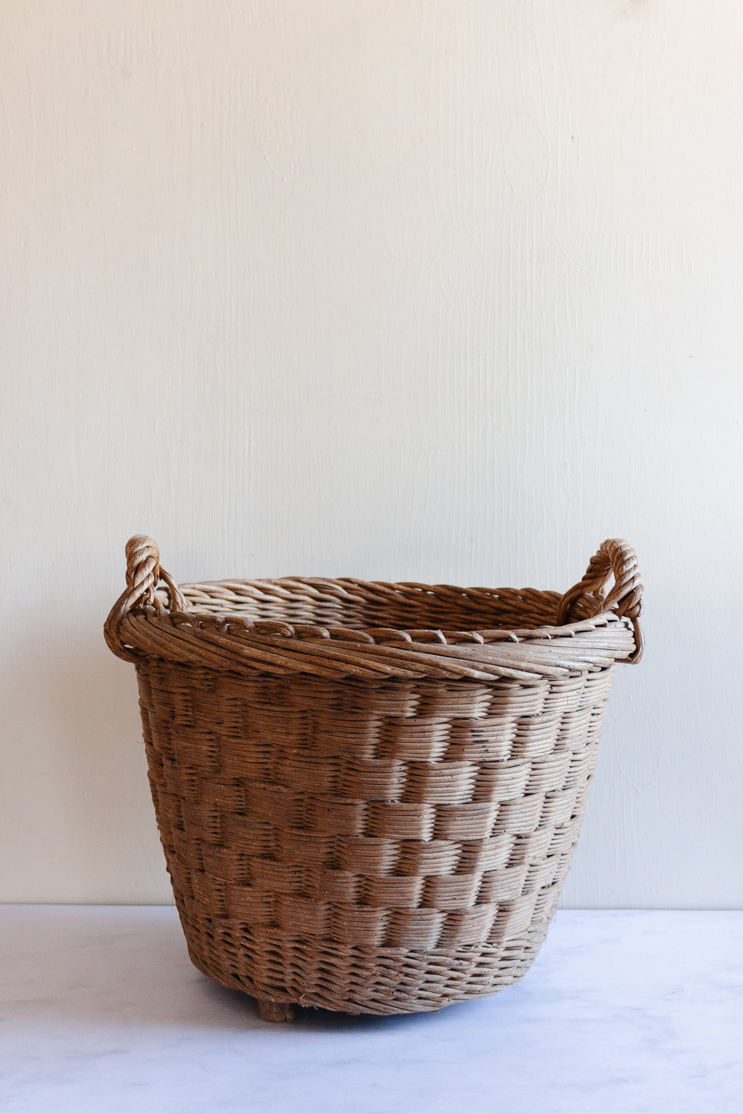 antique French round willow laundry basket