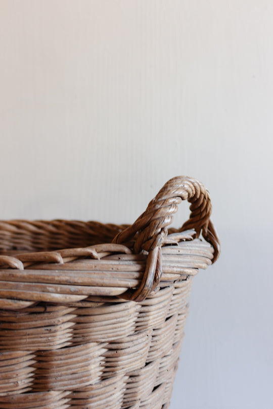 antique French round willow laundry basket