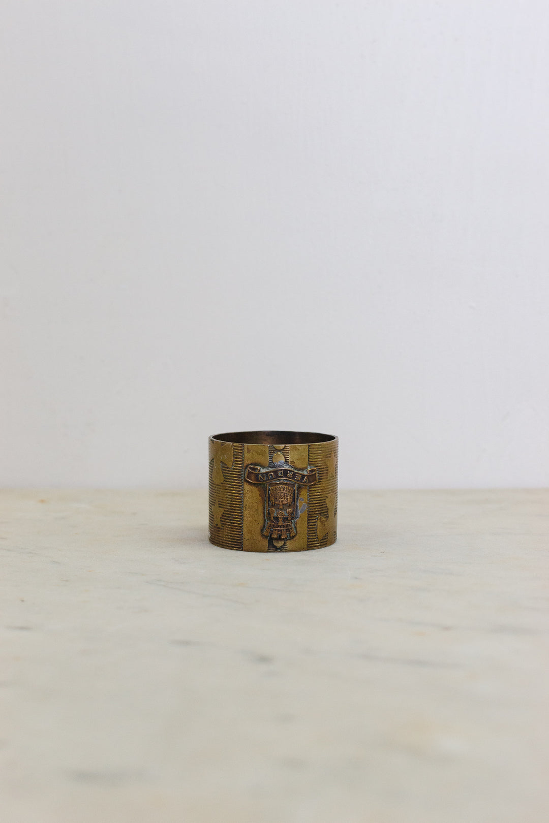 set of 5 assorted brass napkin rings