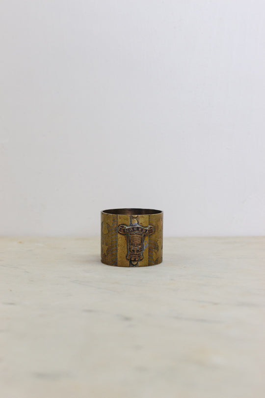 set of 5 assorted brass napkin rings