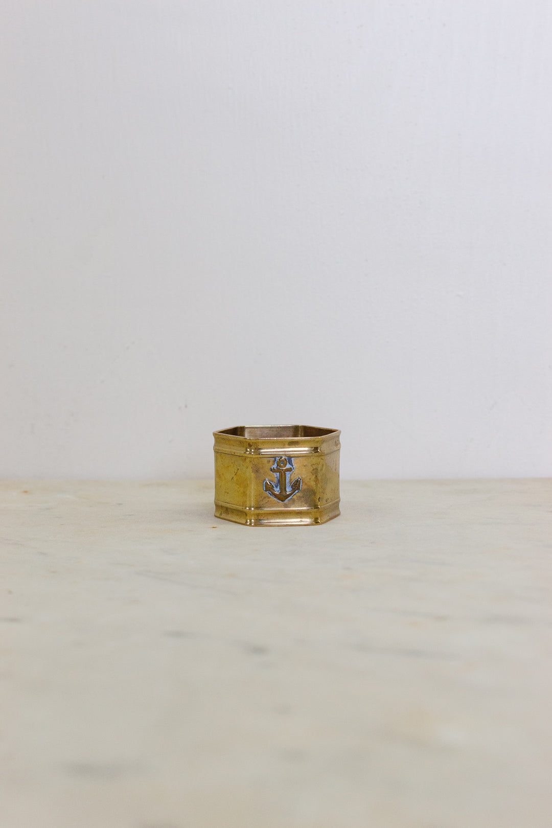 set of 5 assorted brass napkin rings