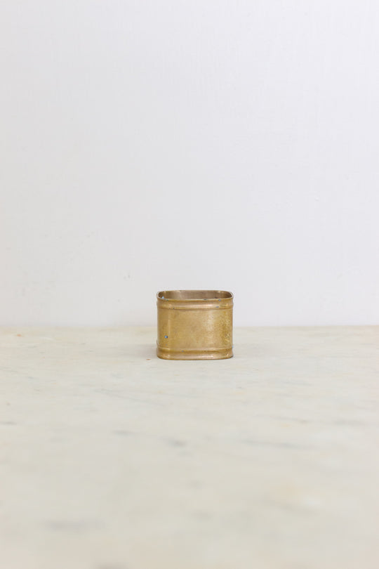 set of 5 assorted brass napkin rings