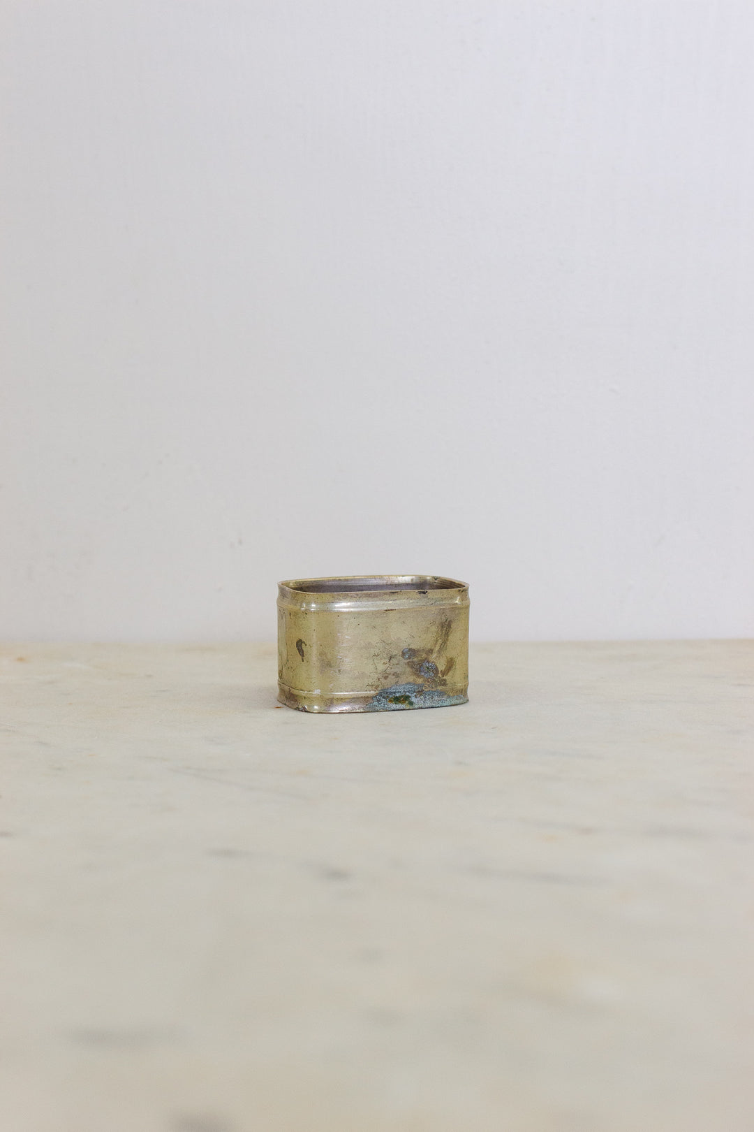 set of 5 assorted brass napkin rings