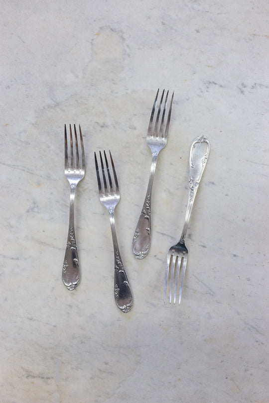 Antique French matching monogrammed 25-piece flatware set