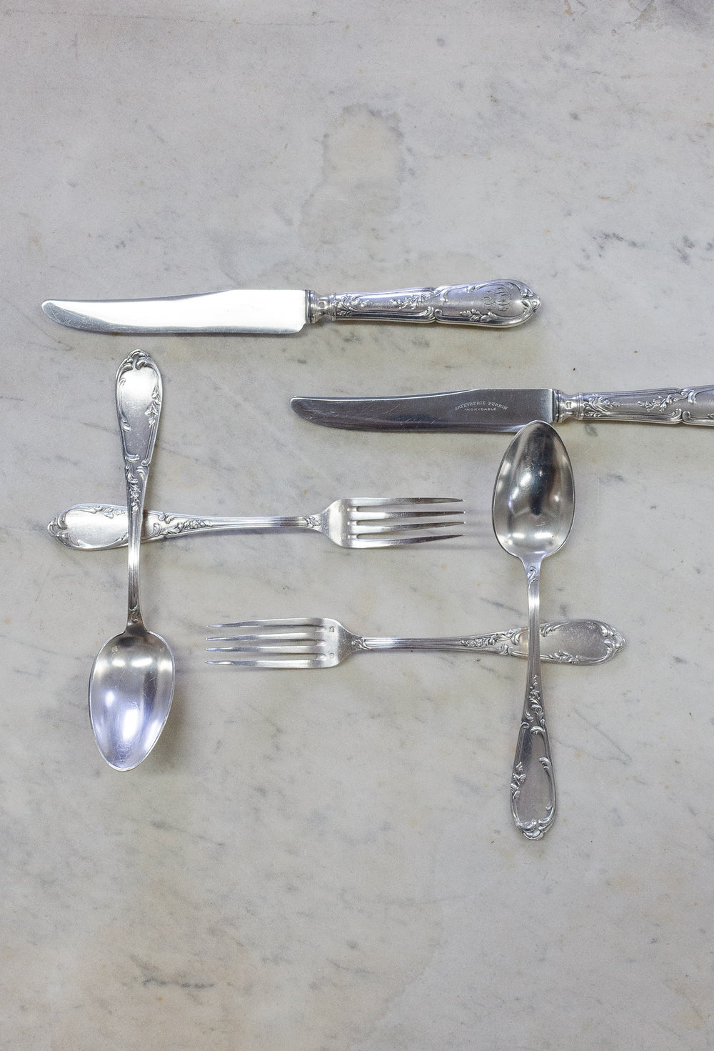 Antique French matching monogrammed 25-piece flatware set