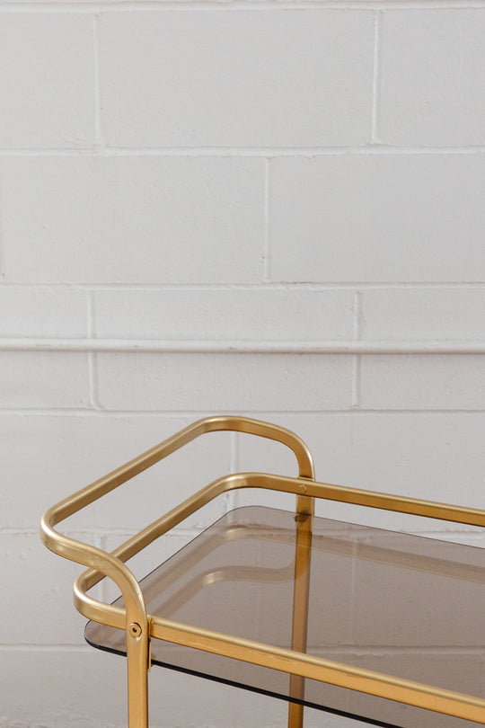 vintage french gold bar cart with glass shelves