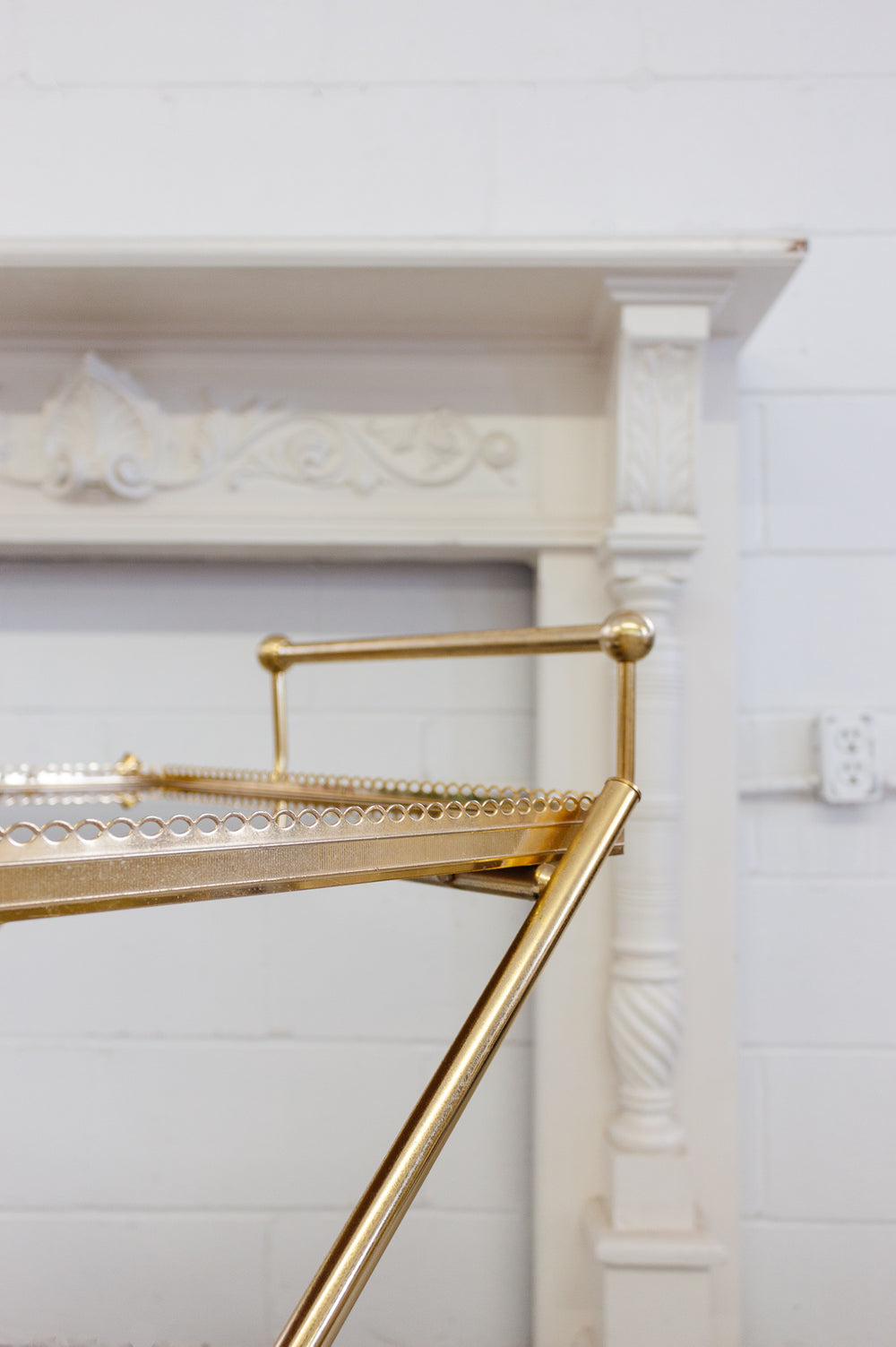 1970s French brass and smoky glass bar cart